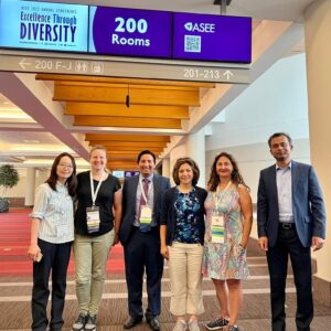 Faculty members: (Prof. Shinae Jang, Connie Syharat, Prof. Davis Chacon, Prof. Sarira Motaref, Aida Ghiaei (SoE), and Prof. Manish Roy pose together for a photo